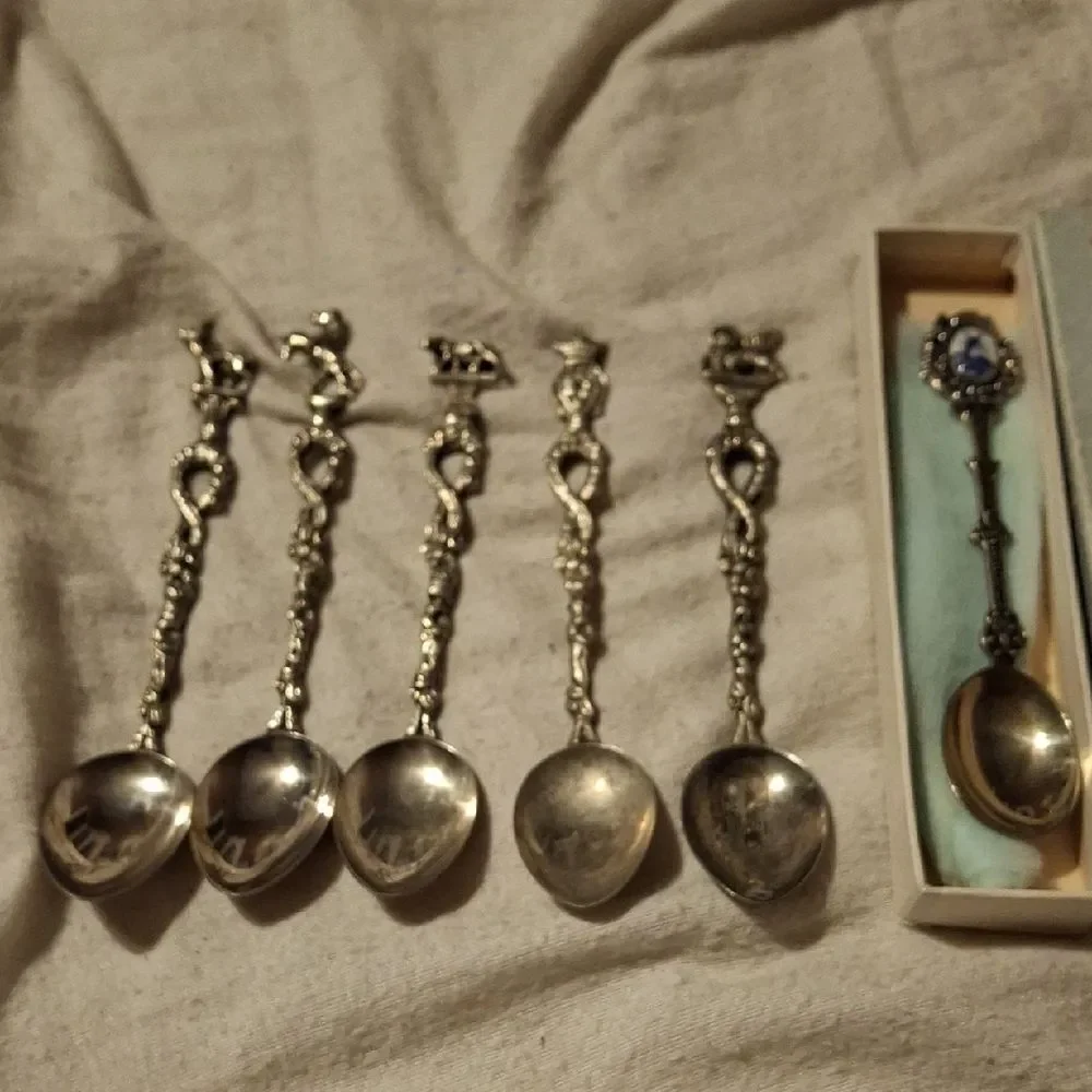 Silver Kitchen Knife Set with Intricate Designs